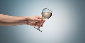close up view of white wine glass