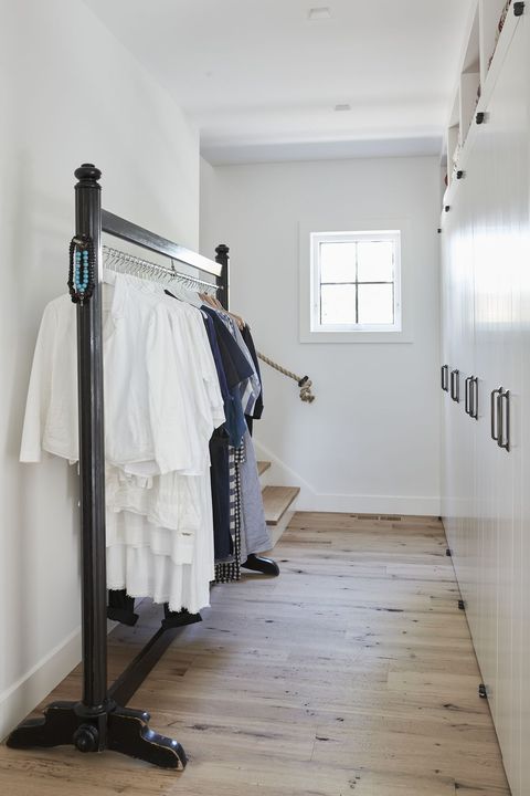 standalone clothing rack in closet