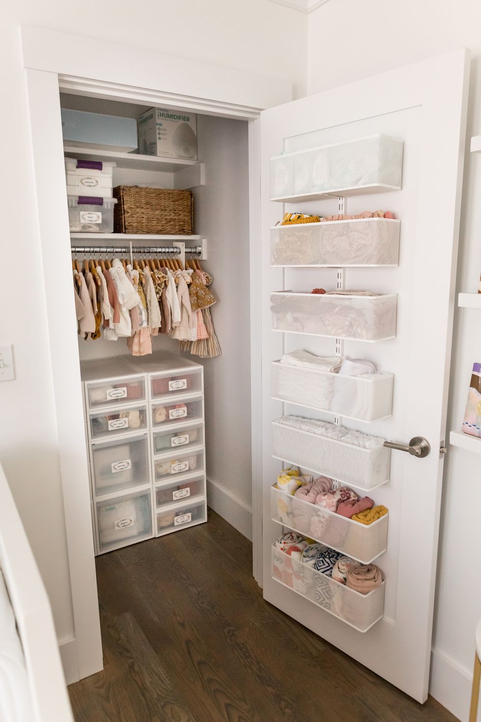 closet organization ideas, nursery closet with labeled bins and clothes hanging