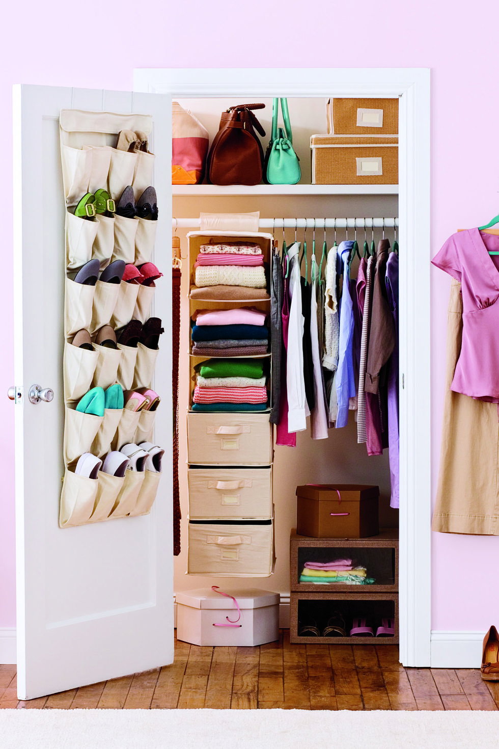 closet organization ideas, shoes in the over the door hanging organizer and clothes in the closet