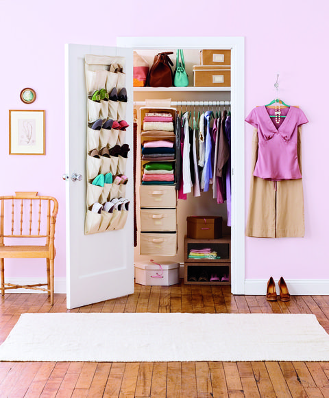 closet organization ideas, shoes in the over the door hanging organizer and clothes in the closet