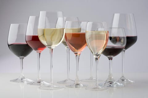 closeup of glasses of different wines