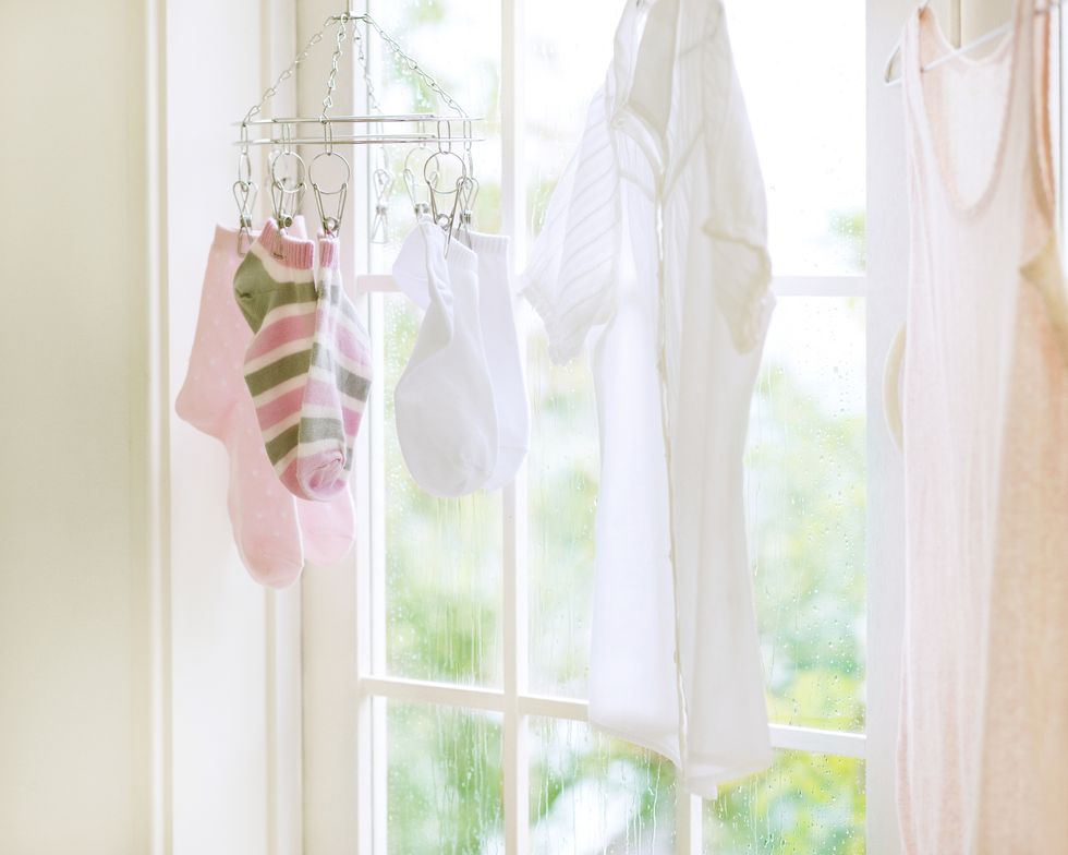clothes hanging from small rack
