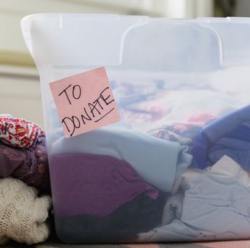 clothes in bin marked for donation