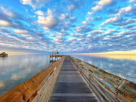 clouds over the south padre island boardwalk