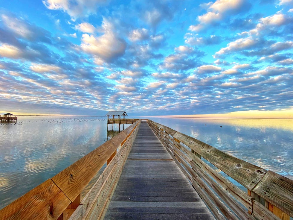 clouds over the south padre island boardwalk