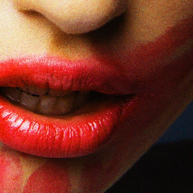 woman with smeared lipstick on face