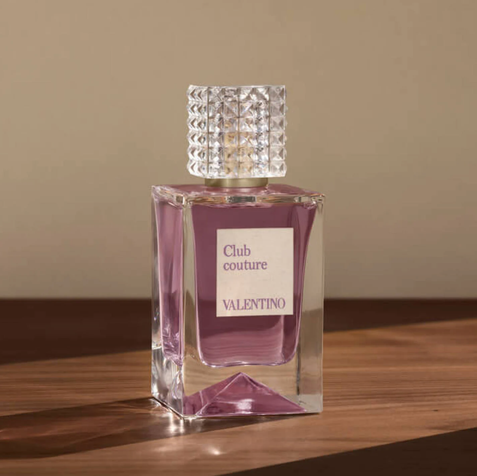 fragrance bottle with a decorative cap and label