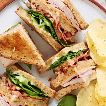 Club Sandwich club sandwich layered with tomato, turkey, ham, bacon, and lettuce