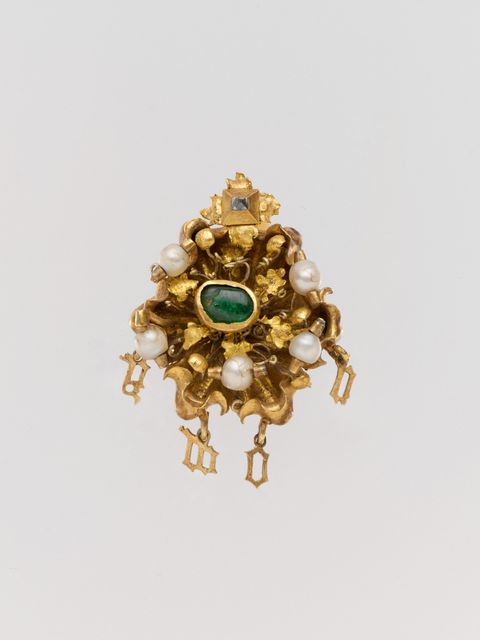 cluster brooch with letters spelling amor, mid 15th century, french, gold, pearl, emerald, silver pin, overall 1 18 x 1516 x 916 inches 29 x 24 x 14 cm, metalwork gold, this gold cluster jewel includes the latin word amor love in delicate gold letters it could have been worn either as a pendant or a brooch, and in portraits of young women many similar jewels are seen in their hair or at the shoulder or neck photo by sepia timesuniversal images group via getty images