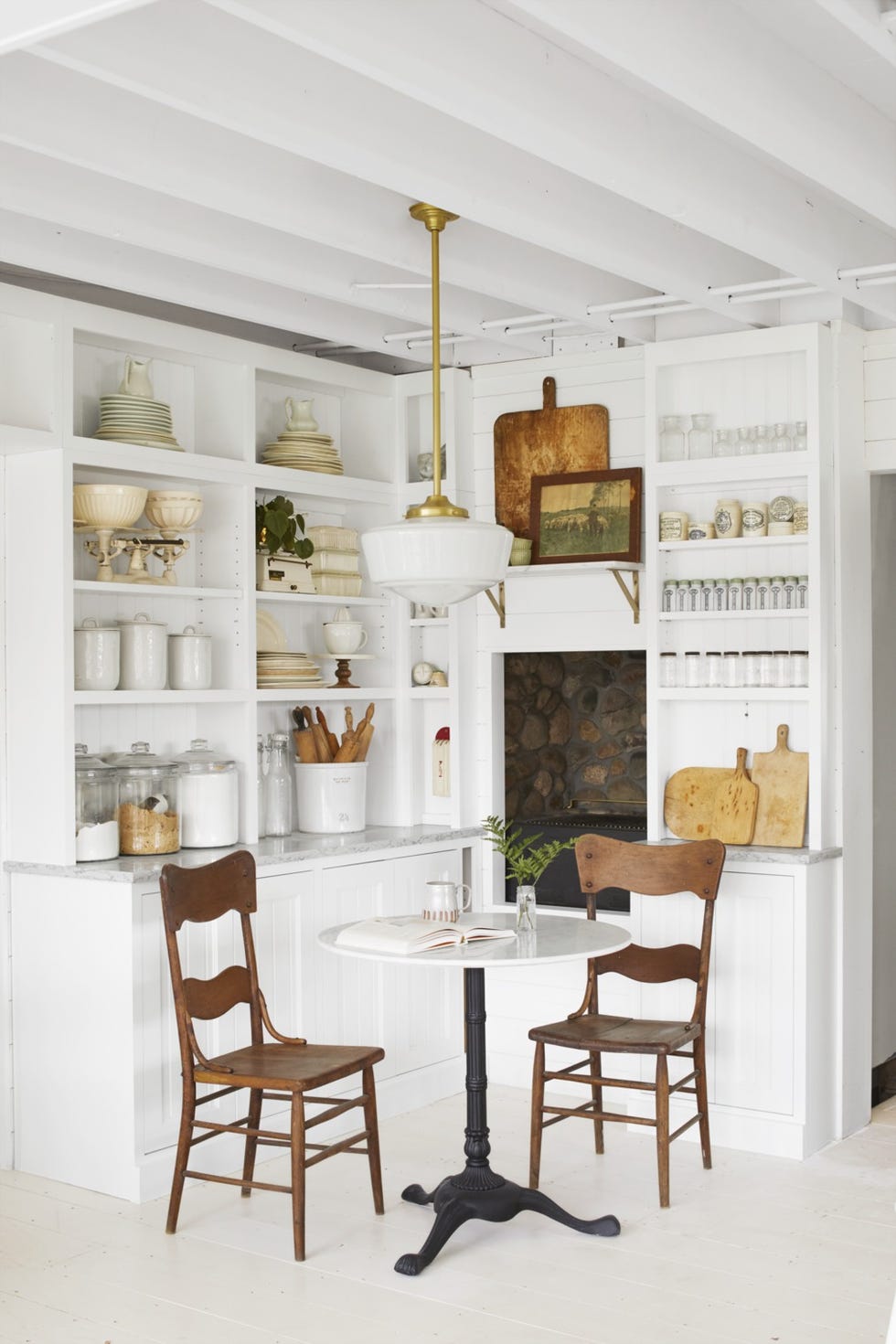 white breakfast nook with open shelving