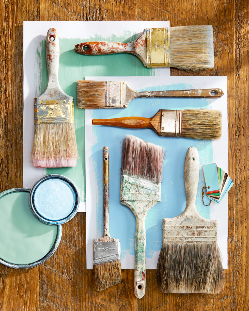 vintage paint brushes and paint can lids