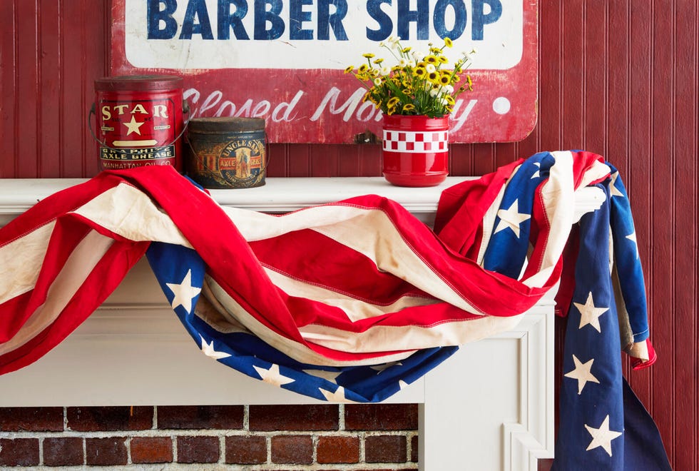 vintage flag bunting draped over a fireplace