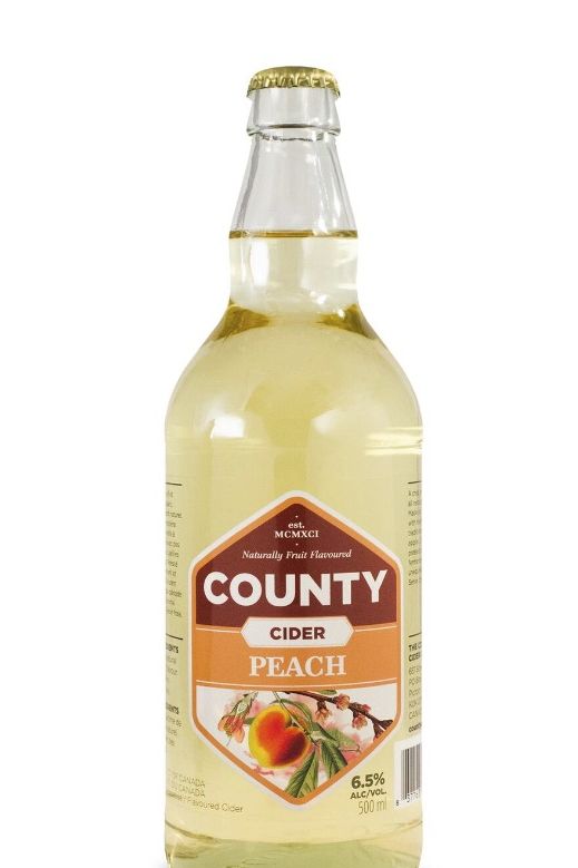 a bottle of peach cider
