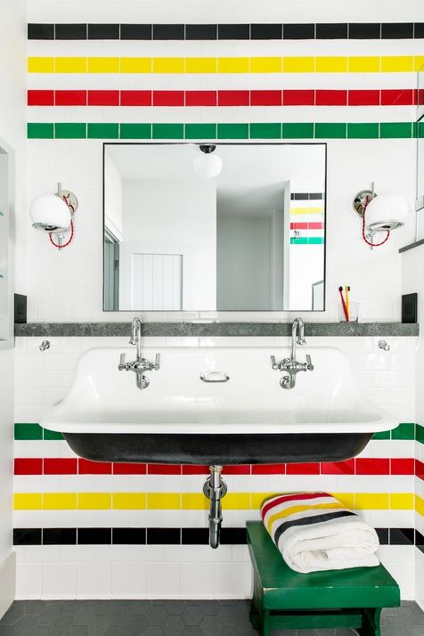 white bathroom with hudson bay striped tiling