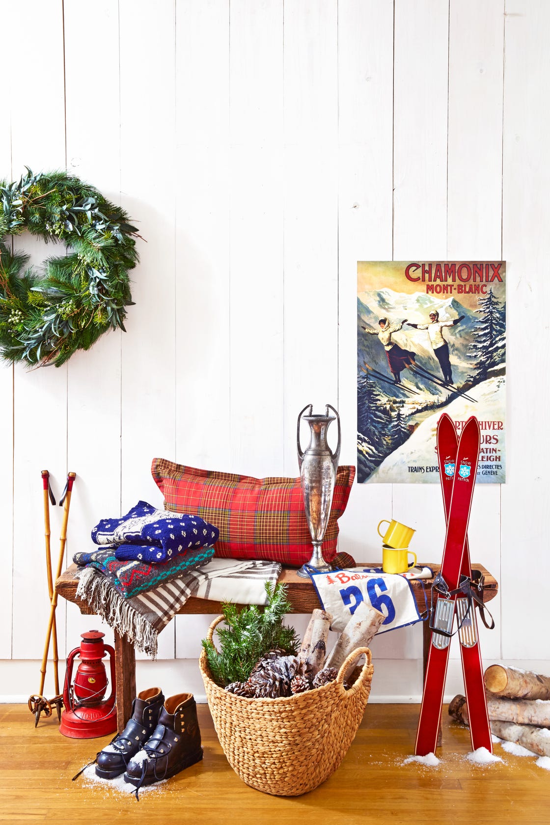 back door bench decorated with ski themed memorabilia and blankets