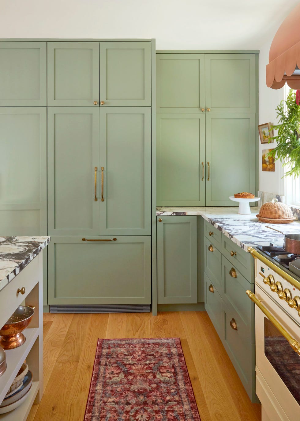 modern kitchen with rustic flair featuring green cabinetry and marble countertops