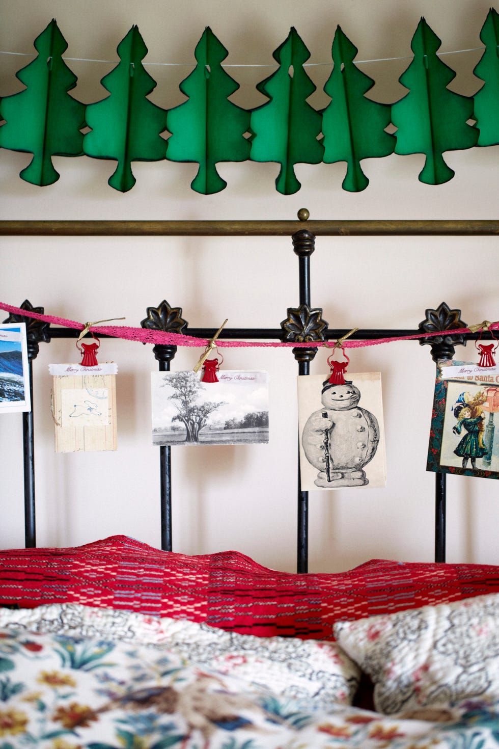 decorative cards displayed on the bed