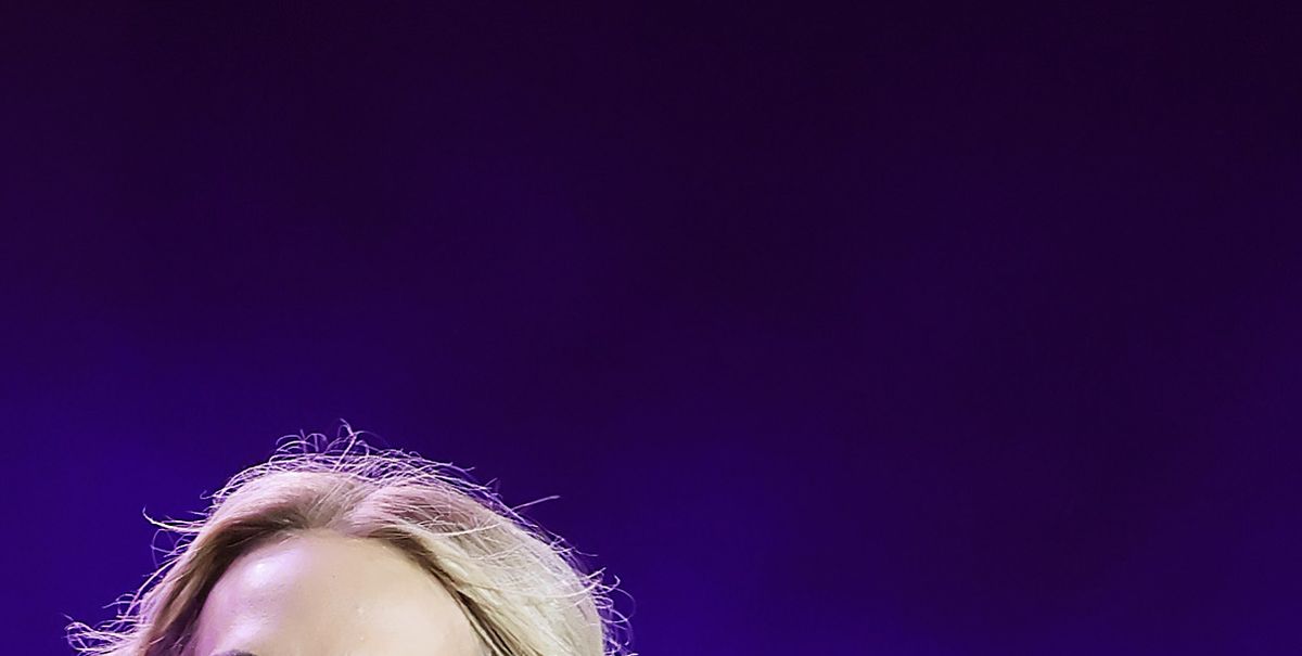 Carrie Underwood exposes her bare chest in see-through jumpsuit
