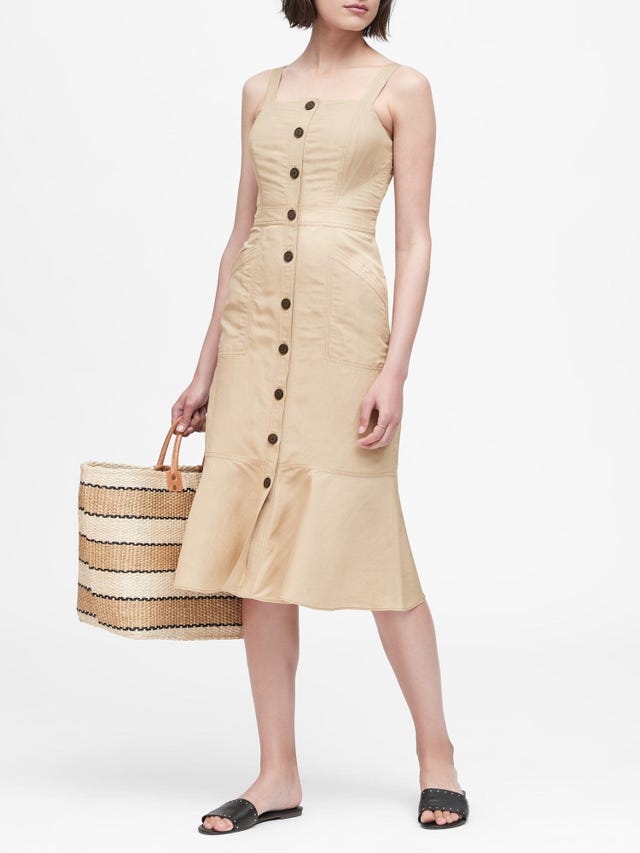 Clothing, Dress, Shoulder, Fashion model, Beige, Cocktail dress, Joint, Sheath dress, Waist, Day dress, 