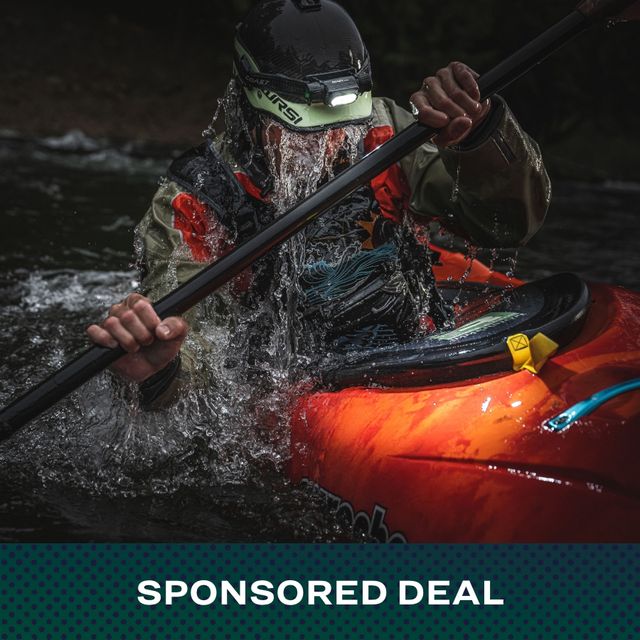 deals of note man paddle boarding at night wearing coast headlamp