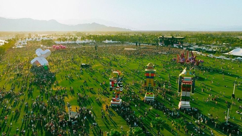 a landscape with trees and buildings, coachella festival sight image