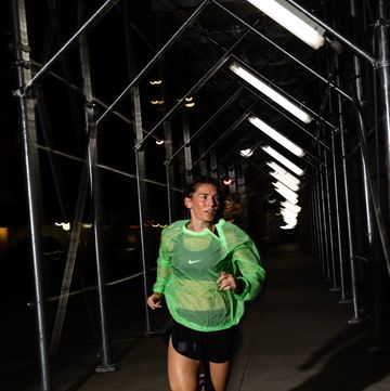 coach jess movold running in nyc at night