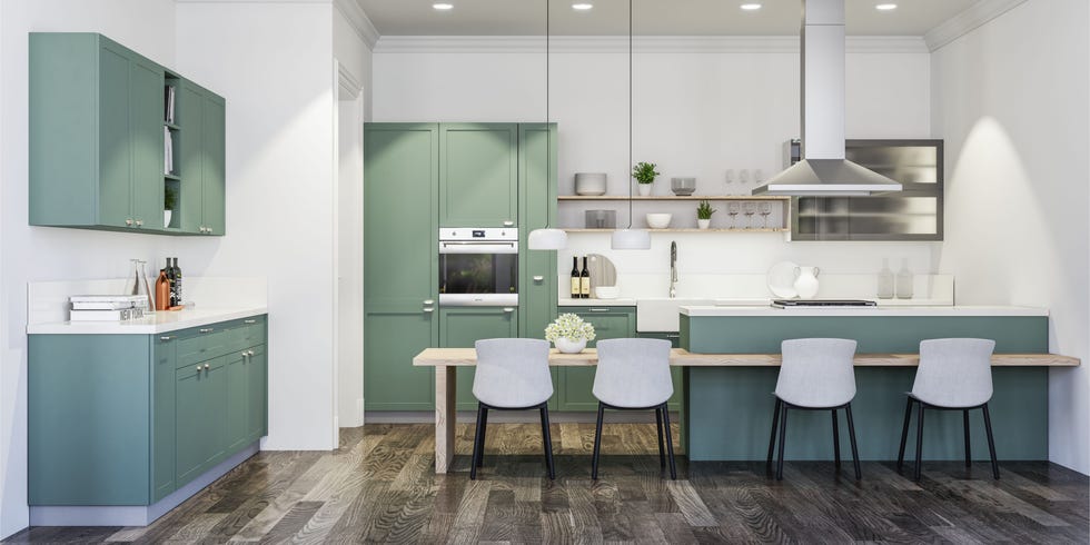 cocina con península en color verde con acabado mate