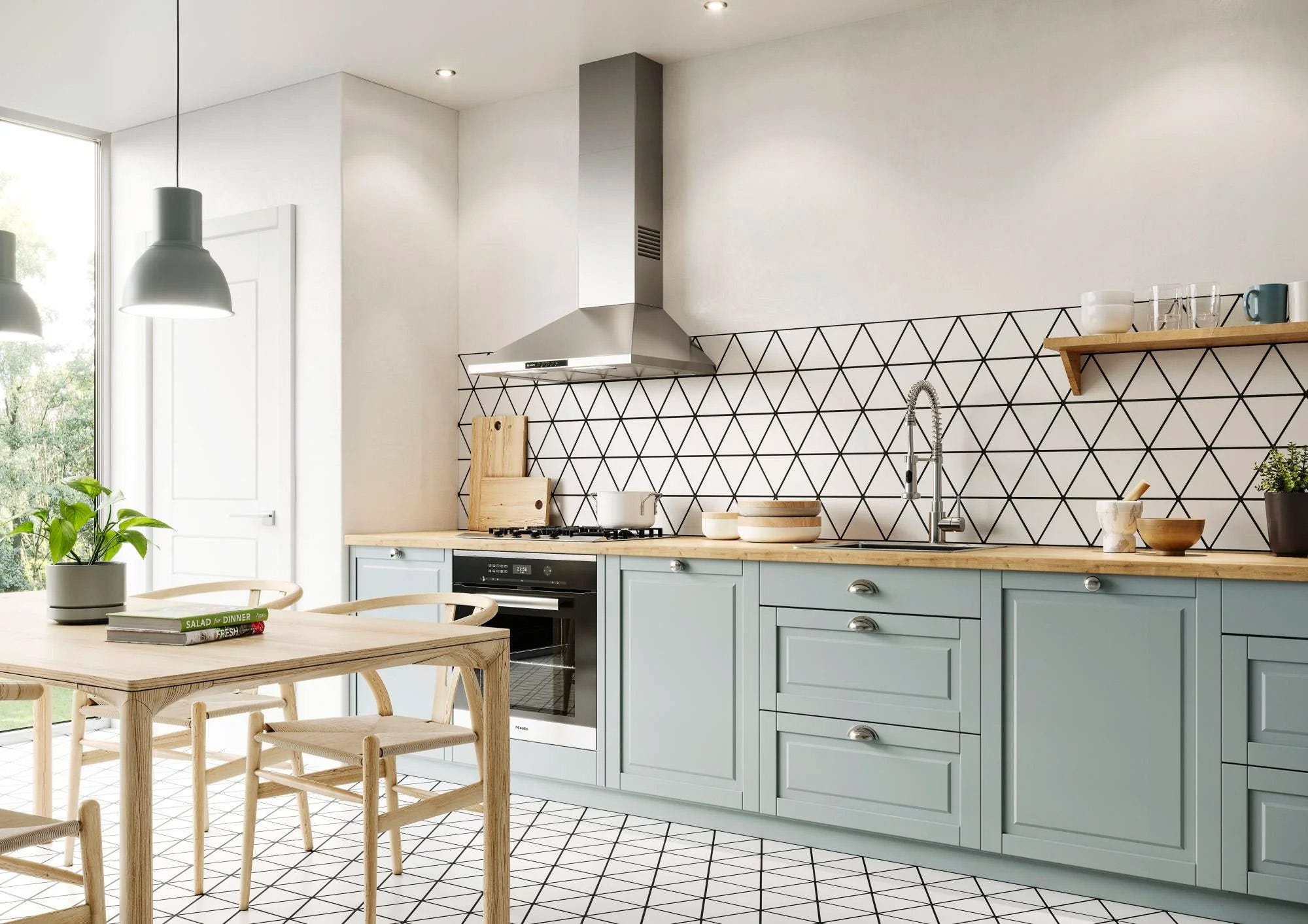 cocina verde con suelo geométrico