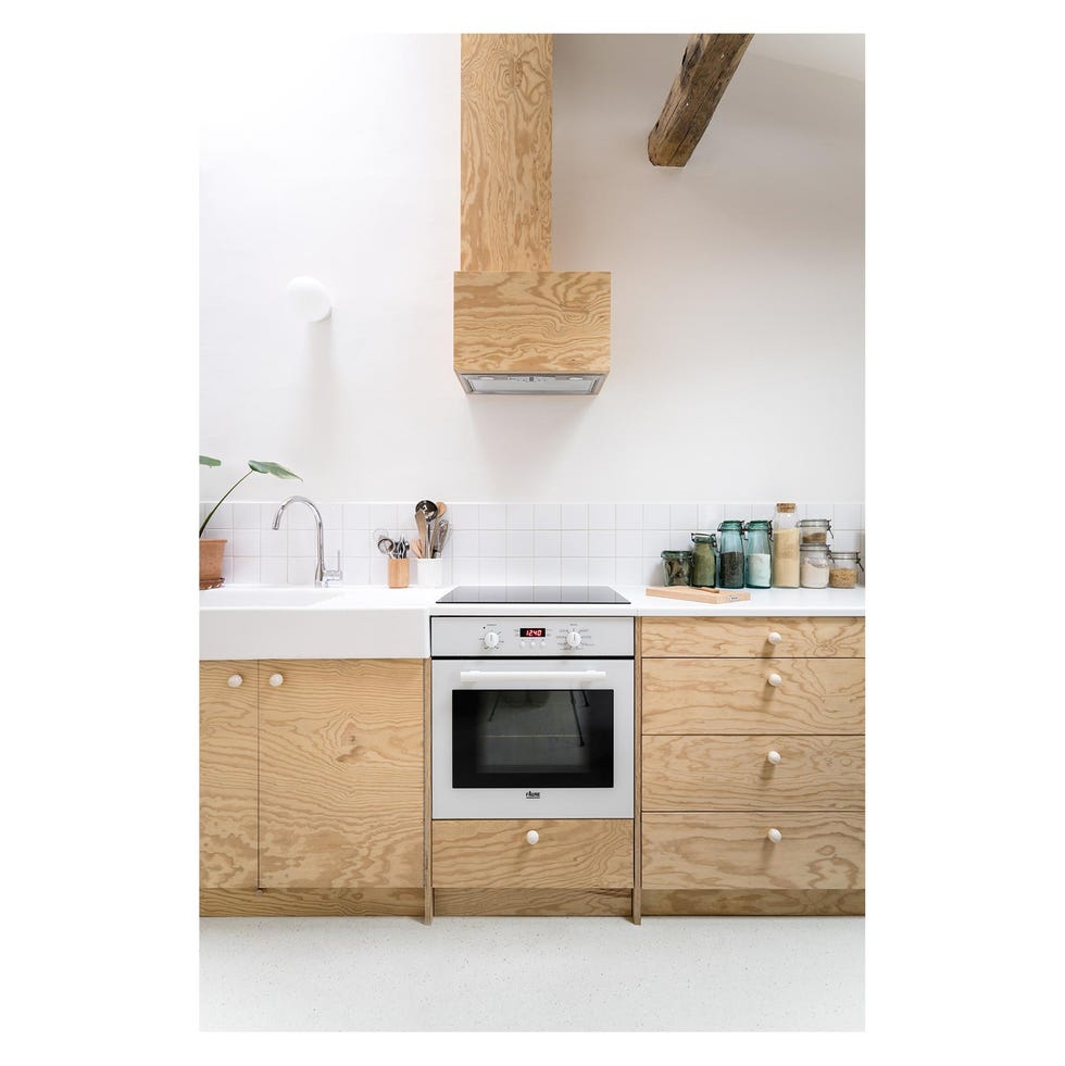 estudio 24m2 en parís de biloba architecture, con cocina en madera