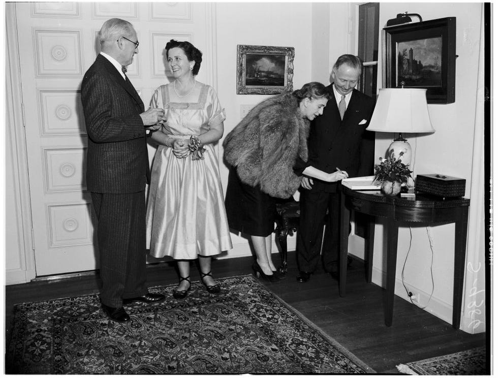 entertaining more than 50 years ago   greeting guests