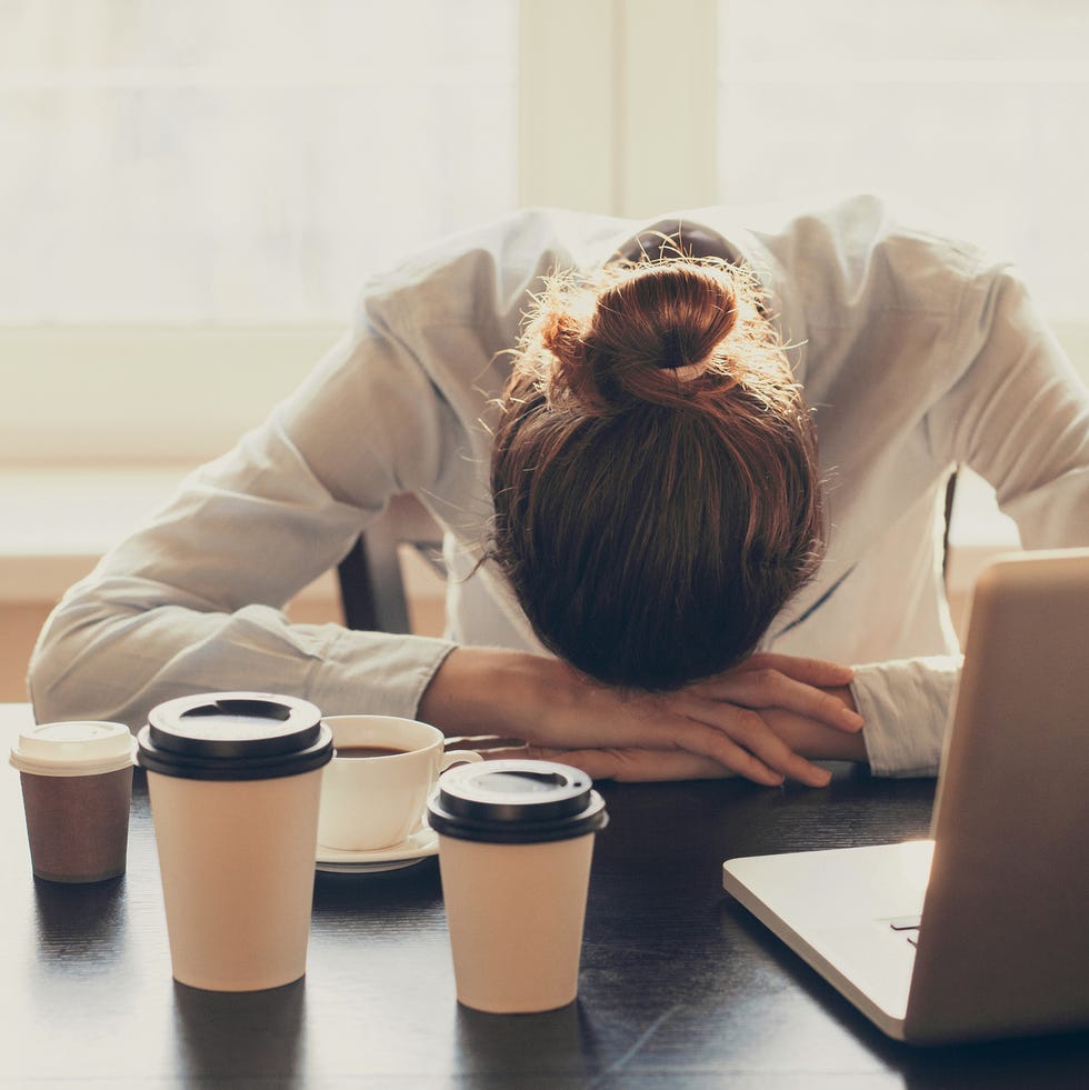 Tired woman in the office