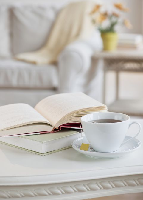 Coffee and book on table