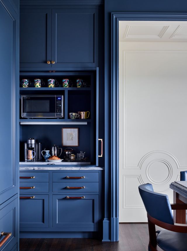 home coffee bar inside blue painted kitchen cabinet