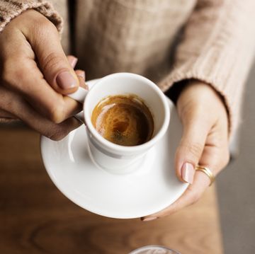 coffee cup, lady's hands holding coffee cup, woman holding a white mug, espresso in white cup