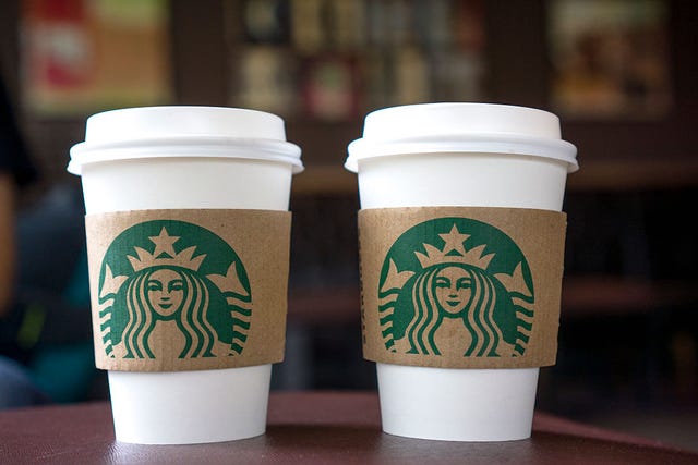 Coffee cups on the table in a Starbucks shop. Last Thursday...