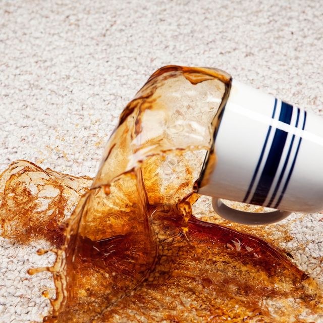 Coffee Spilling from Cup onto Carpet
