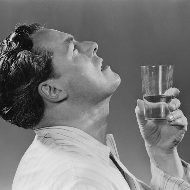 england august 07 a photograph of a man gargling with a glass of water, taken by photographic advertising limited in 1951 photographic advertising limited, founded in 1926, created multi purpose stock images with the potential for selling a range of products whilst enjoying its greatest success during the 1930s, it continued in business until 1977 their trademark, the staged studio photograph resembling a film still, was its selling point and, later, its downfall sophisticated, adaptable and generic, this kind of image gradually fell out of favour as clients increasingly demanded targeted advertising campaigns with specific photographs photo by ssplgetty images