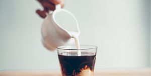 cold brew coffee black coffee in a glass, add milk