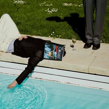 a person lying on a pool