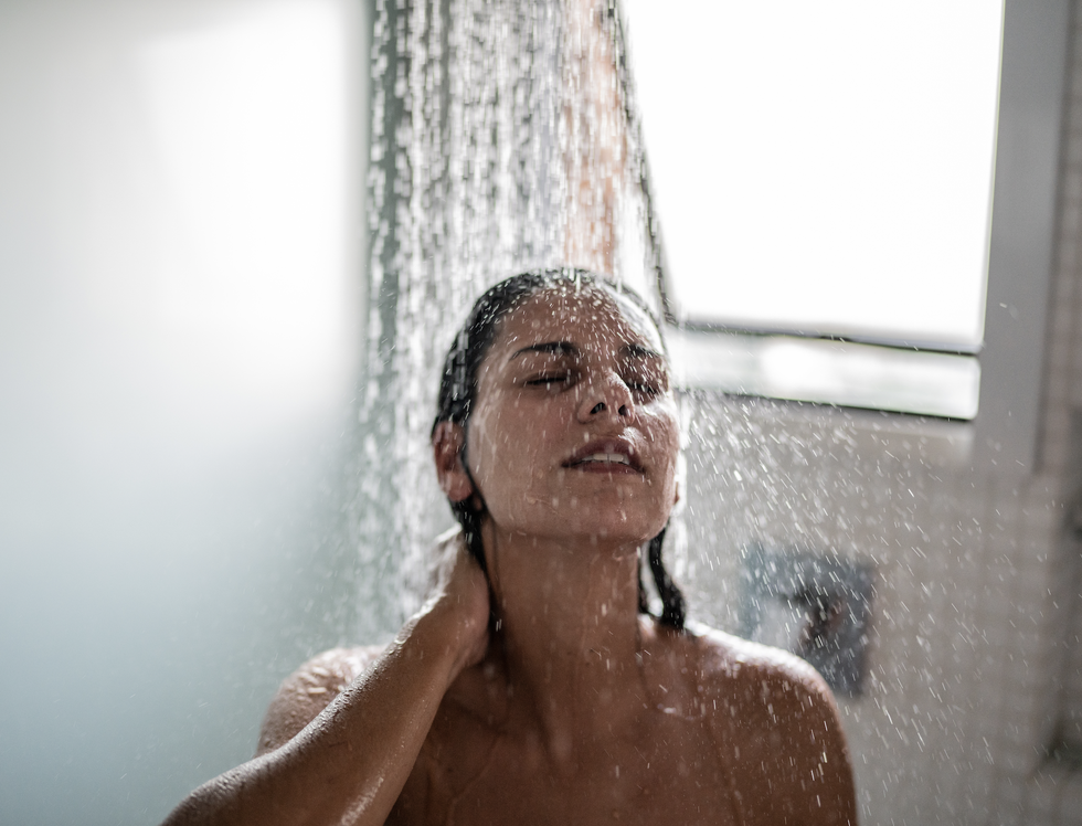 woman takes a shower
