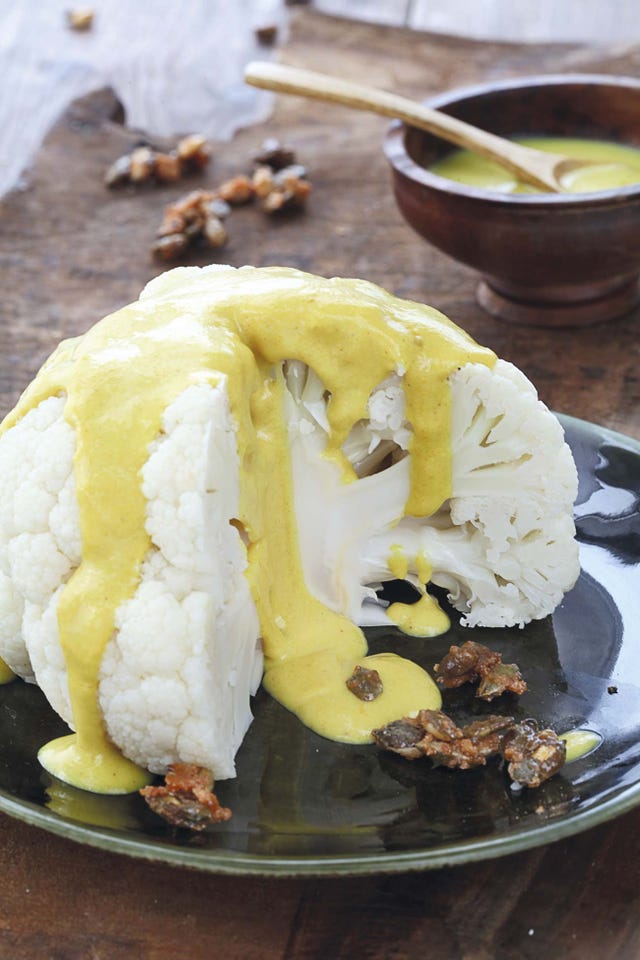 coliflor cocida con salsa de cúrcuma