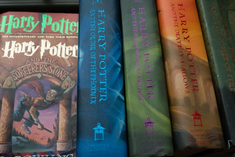 a collection of harry potter books are pictured at the home of caitlin moore in washington, dc