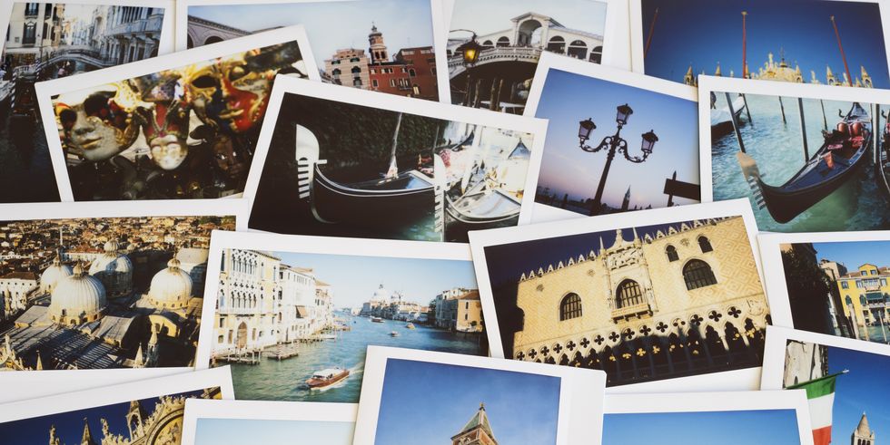 collection of instant film travel holiday photos of venice on a table