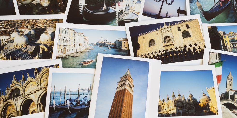 collection of instant film travel holiday photos of venice on a table