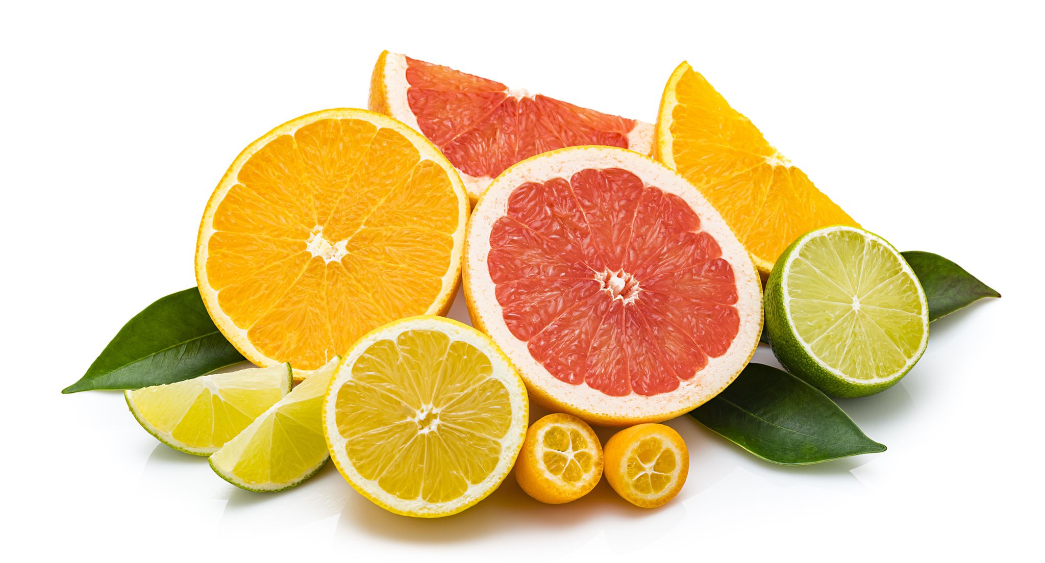collection of whole and sliced citrus fruits isolated on white background