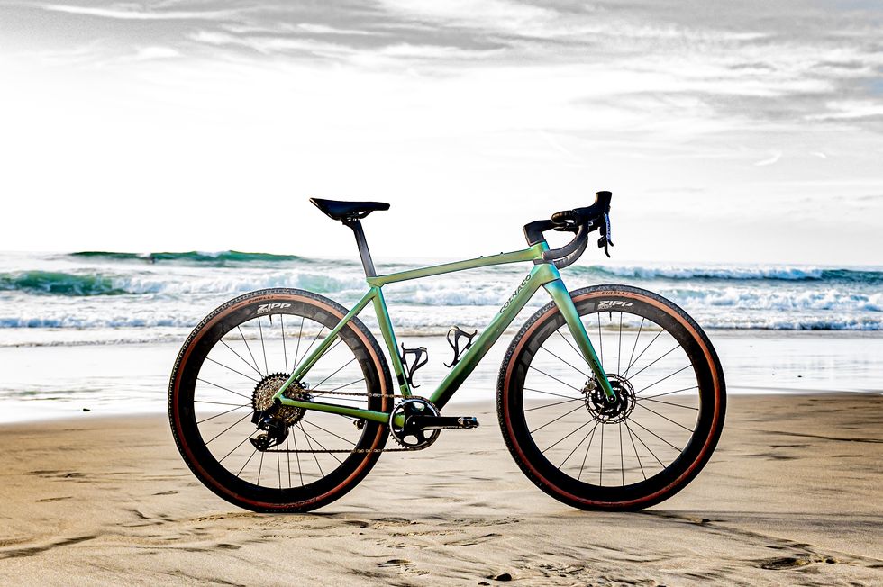 colnago c68 gravel on sand in front of ocean