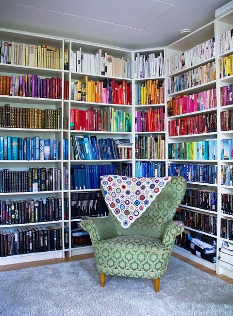 color coordinated books and thrift armchair with granny square blanket color coordinated books and thrift armchair with granny square blanket