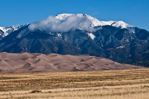 Colorado, Great Sand Dunes National Park and Preserve, View of the Dunes, Framed by the Snow-capped Sangre De Cristo Mountains
