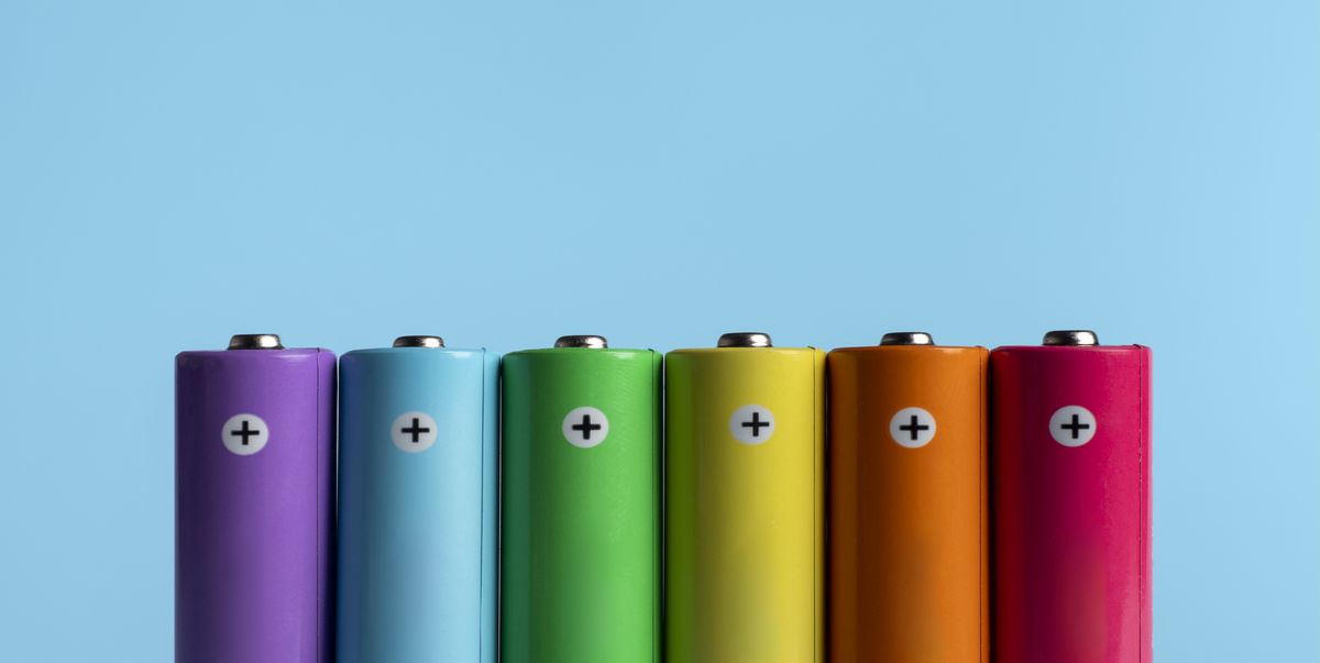 colorful batteries on blue background